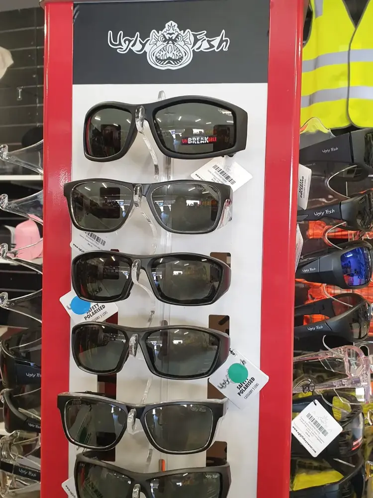 Rack of safety sunglasses at Custom Workwear Ulverstone