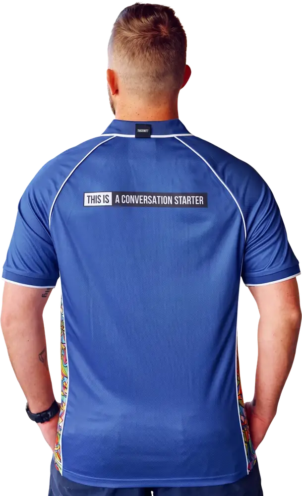 Back of a branded blue work polo with a printed slogan across the shoulders